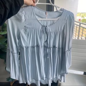 Baby blue Free People ruffle blouse
